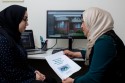 Two women in discussion